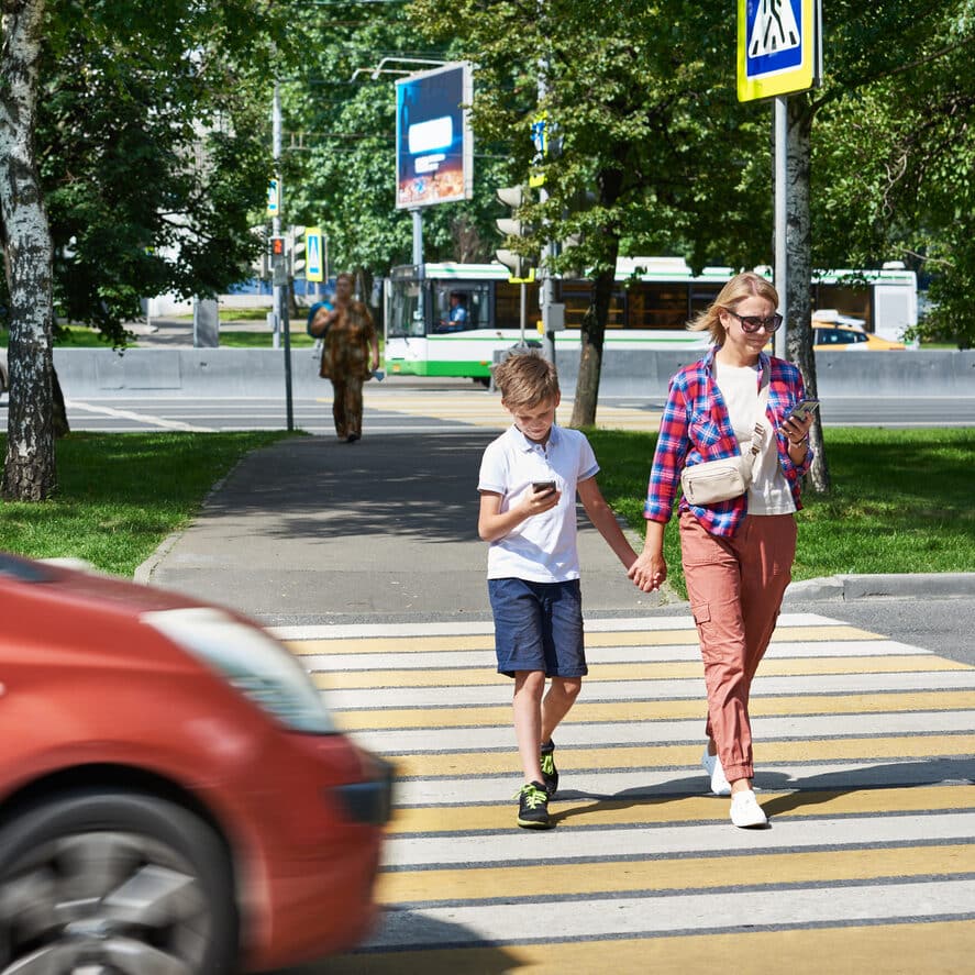 Danger of using smartphone by pedestrians on road