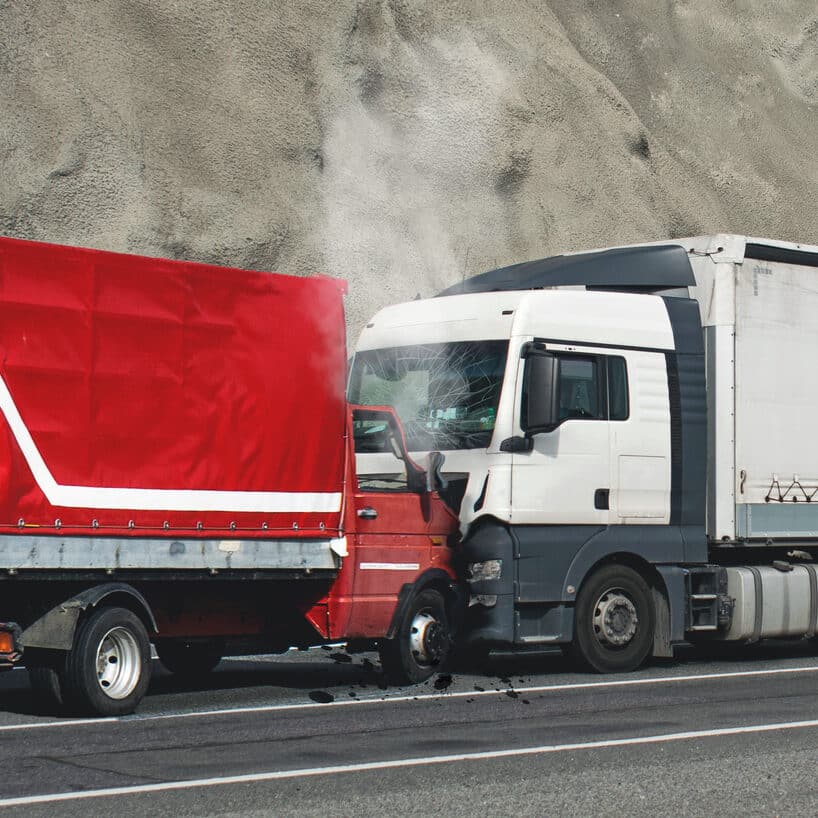Frontal collision between two trucks