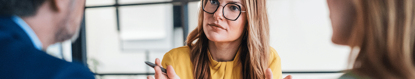 Lawyer and clients conversing